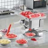 Sausage stuffing attachment fitted to the meat grinder