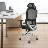 Wongan Hills mesh office chair with high back, lumbar and head support at a desk