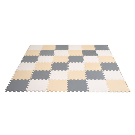 Child playing on foam puzzle play mat