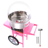Cotton candy machine in use at an outdoor event stall