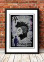Framed A3 pop art print of Prince in bold saturated colour, hung as music themed wall art