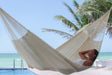 Lanin cream queen size nylon hammock hung outdoors
