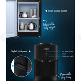 Storage cabinet in the base of the black floor standing water cooler