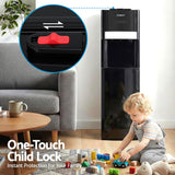 Cabinet door open showing the bottom loading bottle compartment