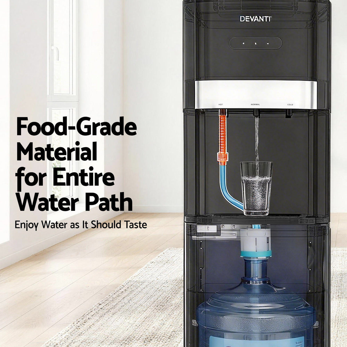 Black water cooler filling a glass with chilled water