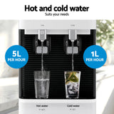 White water dispenser standing in a kitchen setting