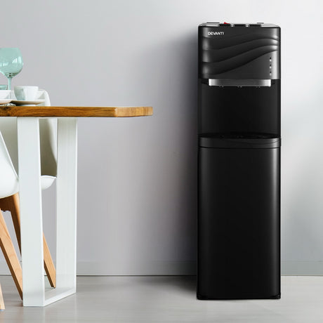 Black bottom load water cooler dispenser standing 104 cm tall with hot and cold taps
