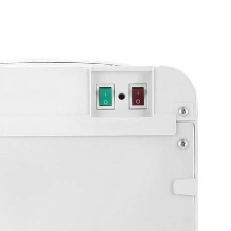 Rear view showing hot and cold on off switches on white water cooler dispenser